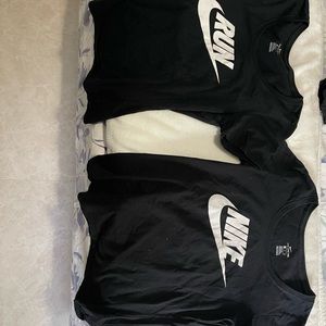 Bundle of 2 Nike Short Sleeved Tees. Sizes Small. Both black + white letters.